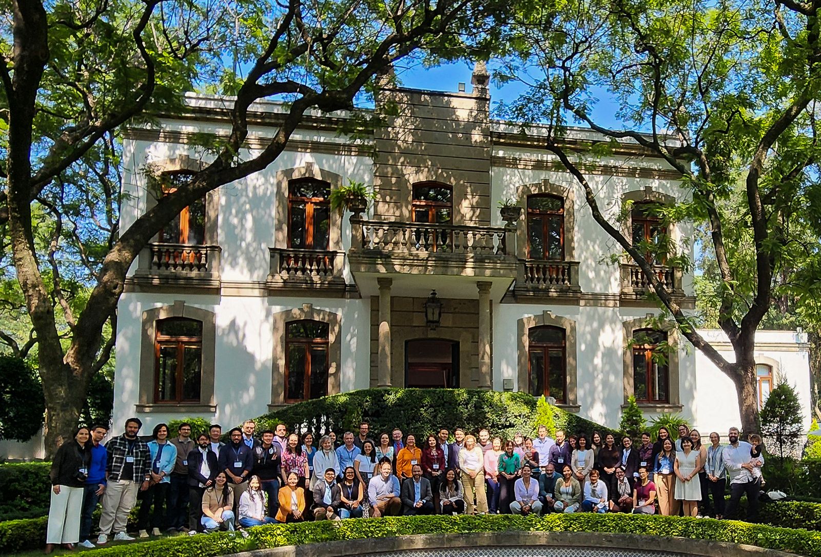 SALURBAL team group photo in front of a historic building